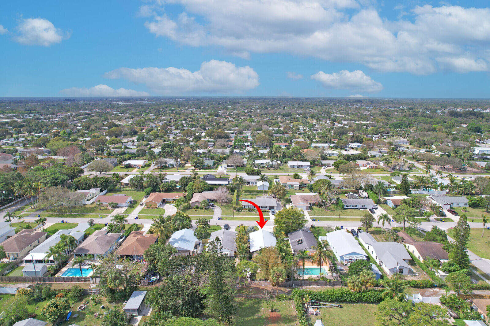 503 North Perry Avenue Jupiter, FL 33458 - Photo 42 of 44 an aerial view of residential building with green space