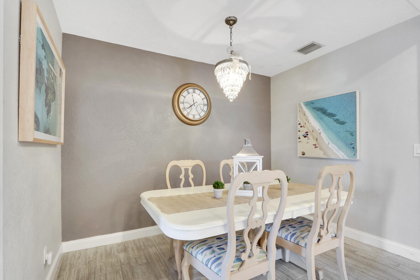 503 North Perry Avenue Jupiter, FL 33458 - Photo 8 of 44 a view of a dining area with furniture and wooden floor