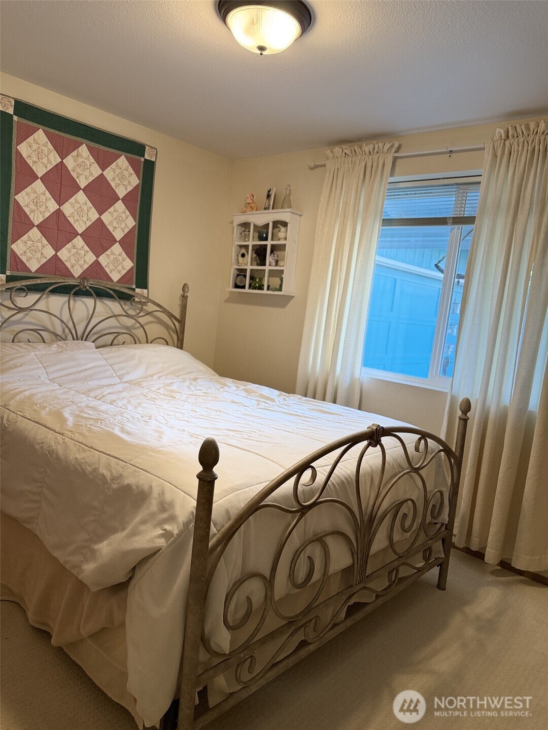 10 Danielle Court Sequim, WA 98382 - Photo 29 of 35 a bedroom with a bed and window