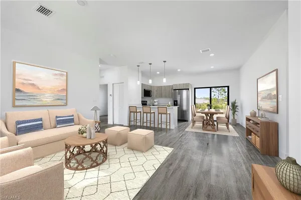 a living room with furniture and a table