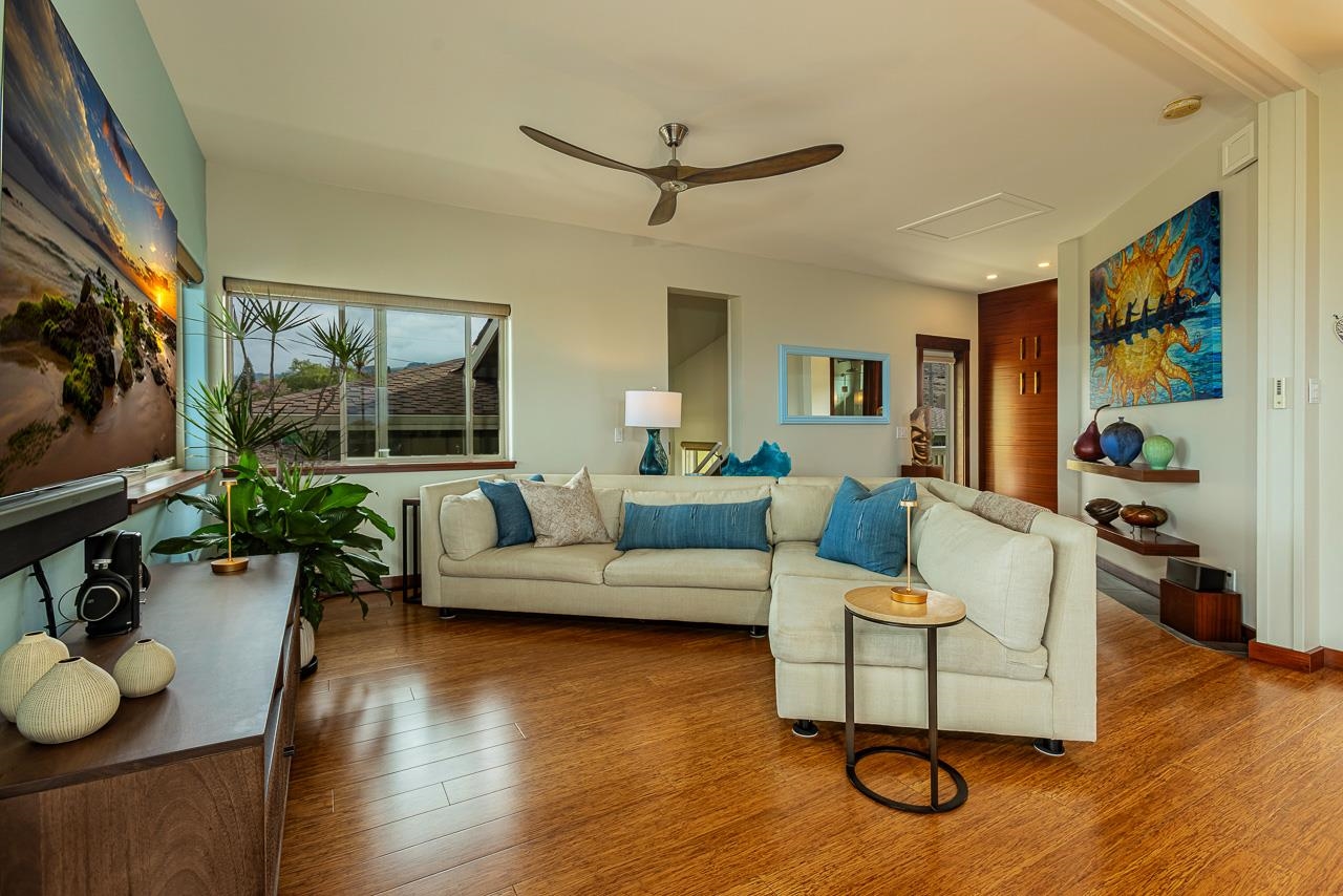 1350 Naalae Road Kula, HI 96790 - Photo 50 of 50 a living room with furniture and wooden floor