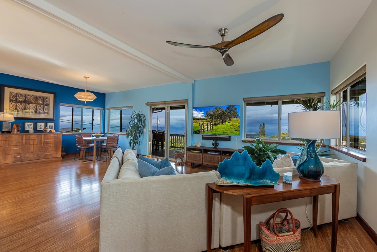 1350 Naalae Road Kula, HI 96790 - Photo 11 of 50 a living room with furniture and a flat screen tv