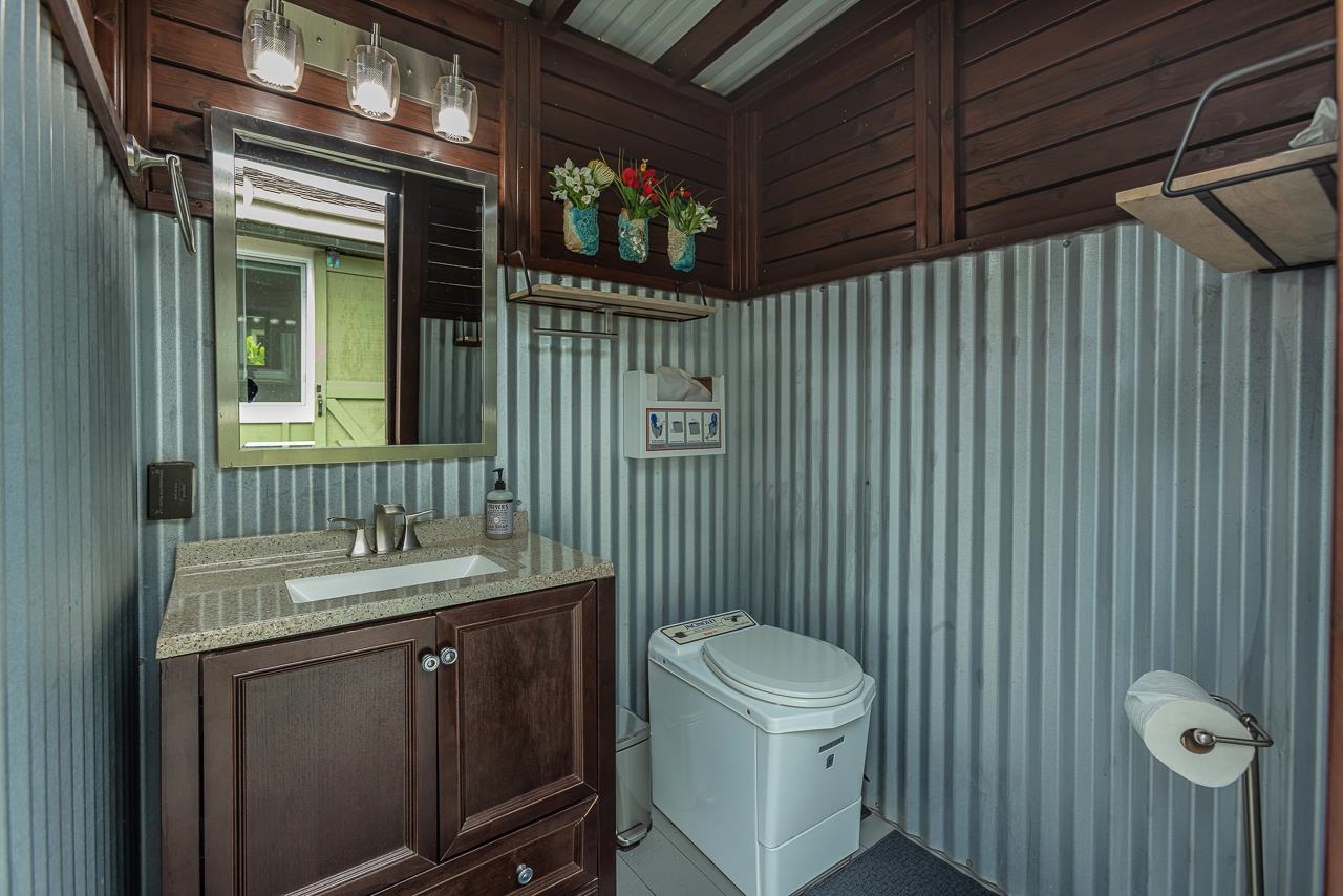 1350 Naalae Road Kula, HI 96790 - Photo 29 of 50 a bathroom with a sink a toilet and shower