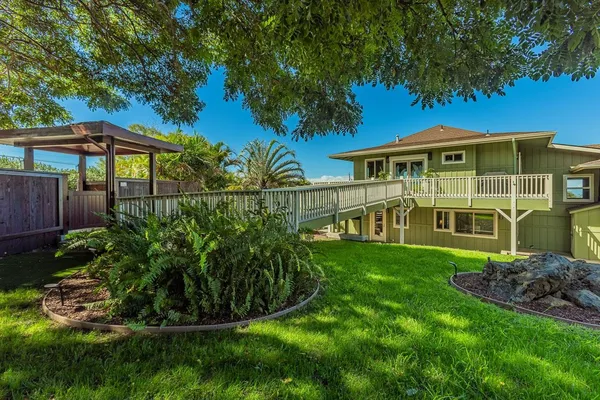 a view of balcony with furniture