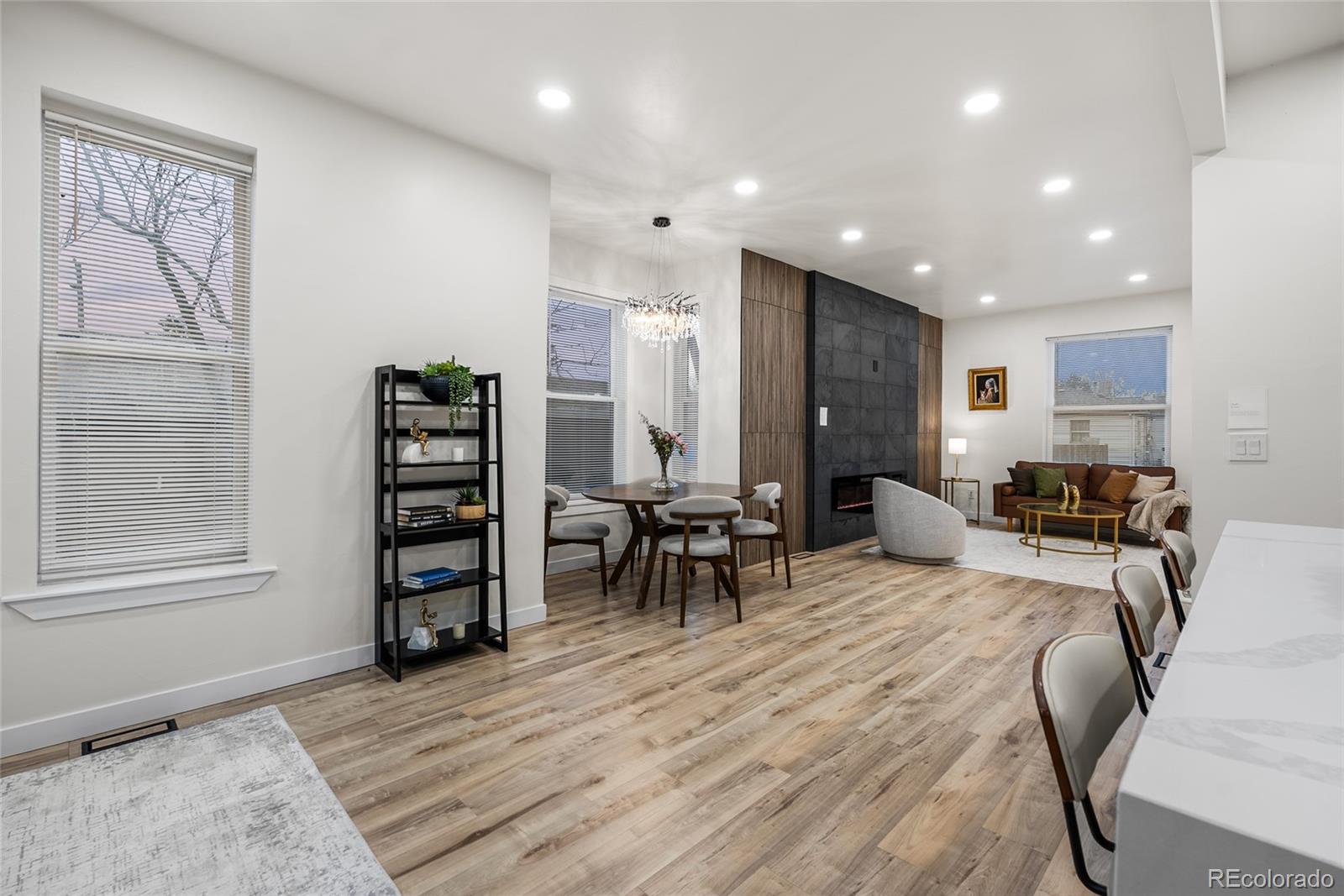 2011 West Scott Place Denver, CO 80211 - Photo 15 of 46 a view of a livingroom with furniture and a large window