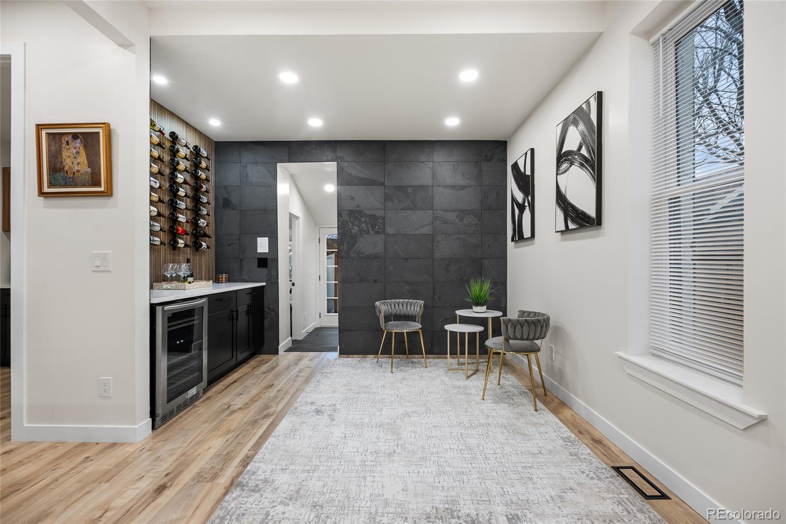2011 West Scott Place Denver, CO 80211 - Photo 16 of 46 a view of a livingroom with furniture and window