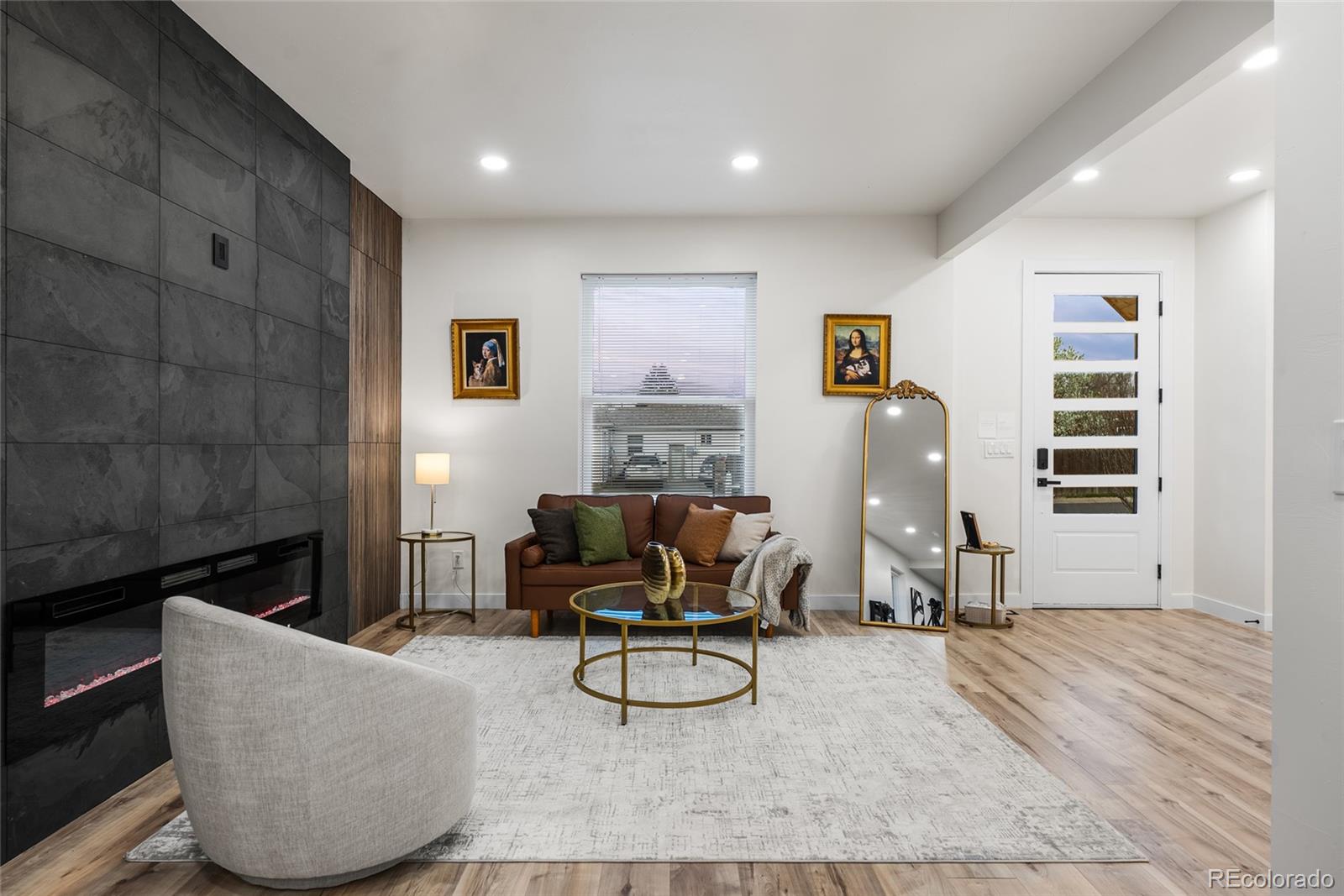 2011 West Scott Place Denver, CO 80211 - Photo 3 of 46 a living room with furniture and a piano