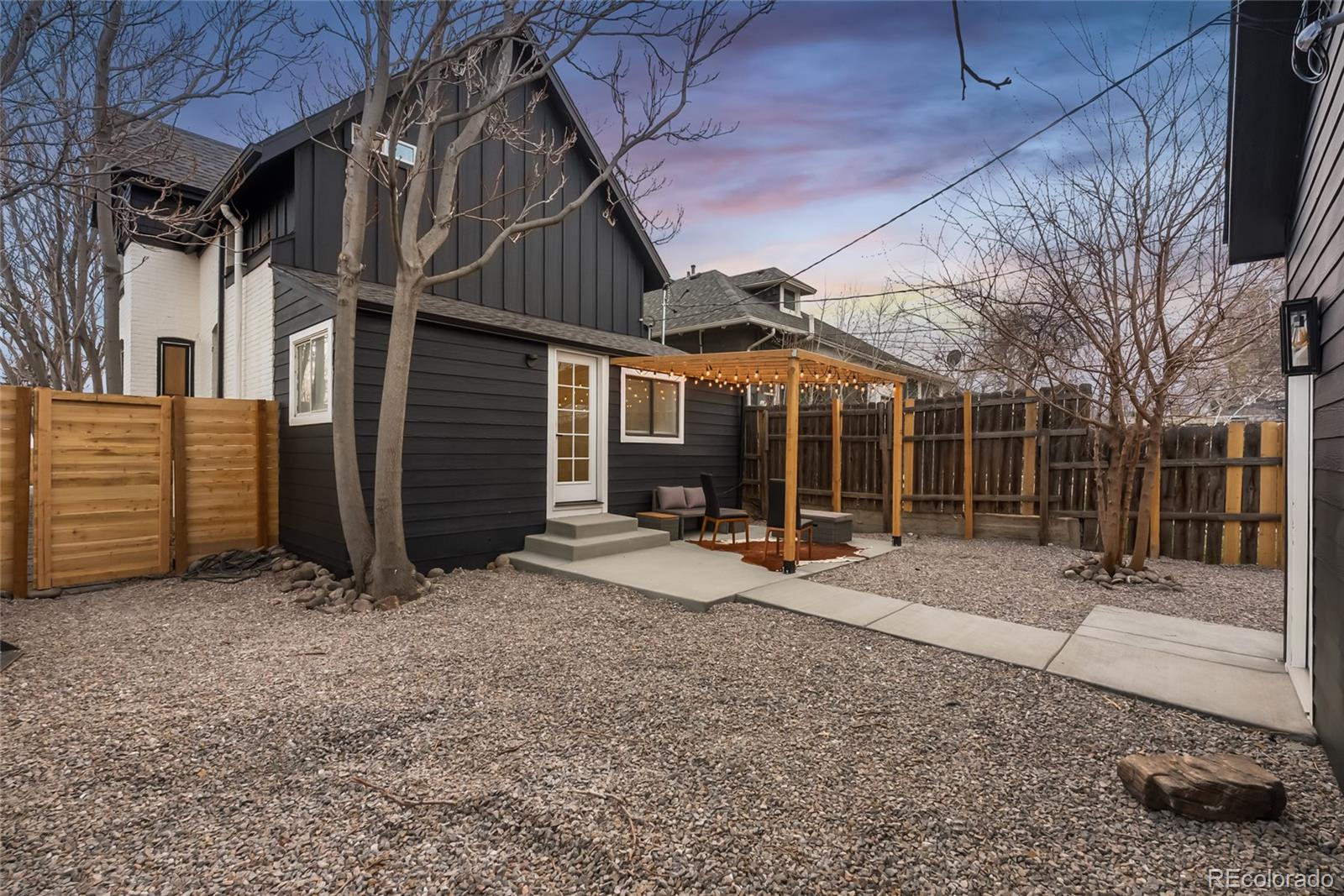 2011 West Scott Place Denver, CO 80211 - Photo 35 of 46 a view of a house with a backyard