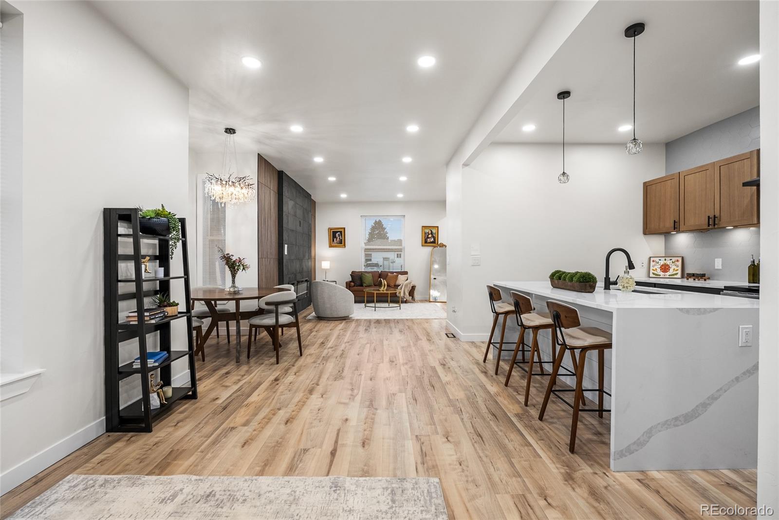 2011 West Scott Place Denver, CO 80211 - Photo 10 of 46 a living room with furniture and a wooden floor