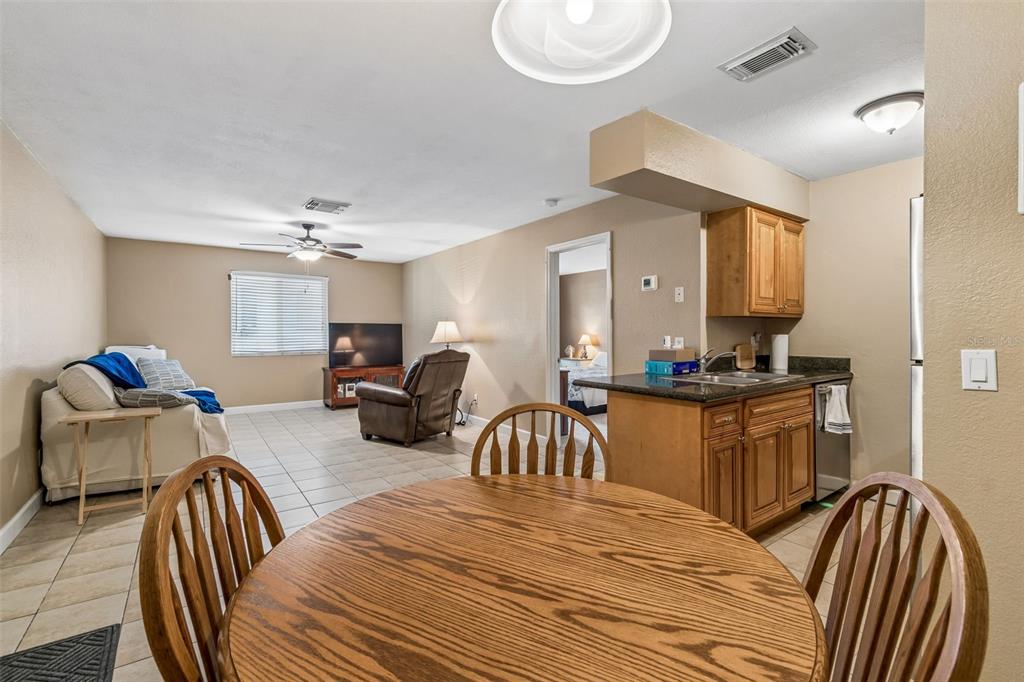 229 Red Maple Place Brandon, FL 33510 - Photo 4 of 45 a bedroom with furniture and a window