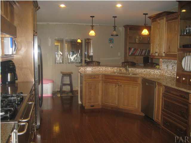 1375 Ridge Way Cantonment, FL 32533 - Photo 2 of 10 Custom Kitchen with granite counters and g=hardwood floors!
