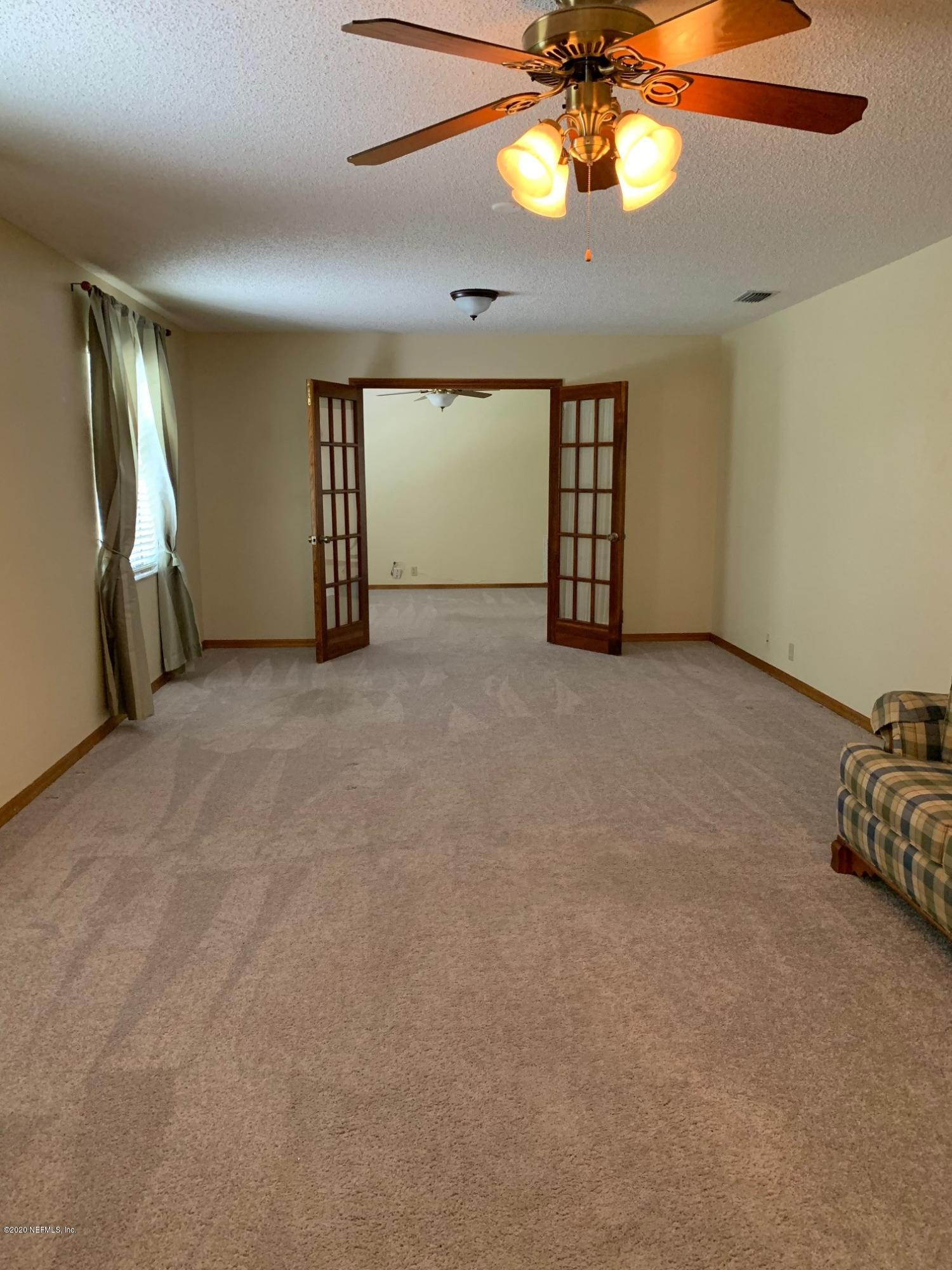 140 Confederate Point Road Palatka, FL 32177 - Photo 11 of 25 Living Rm/Dining Rm