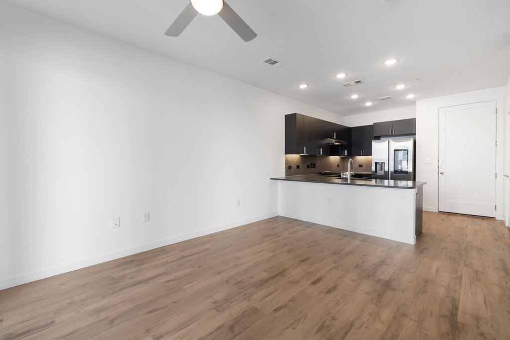 4801 Springdale Road, Unit 1106 Austin, TX 78723 - Photo 5 of 40 a view of kitchen with wooden floor