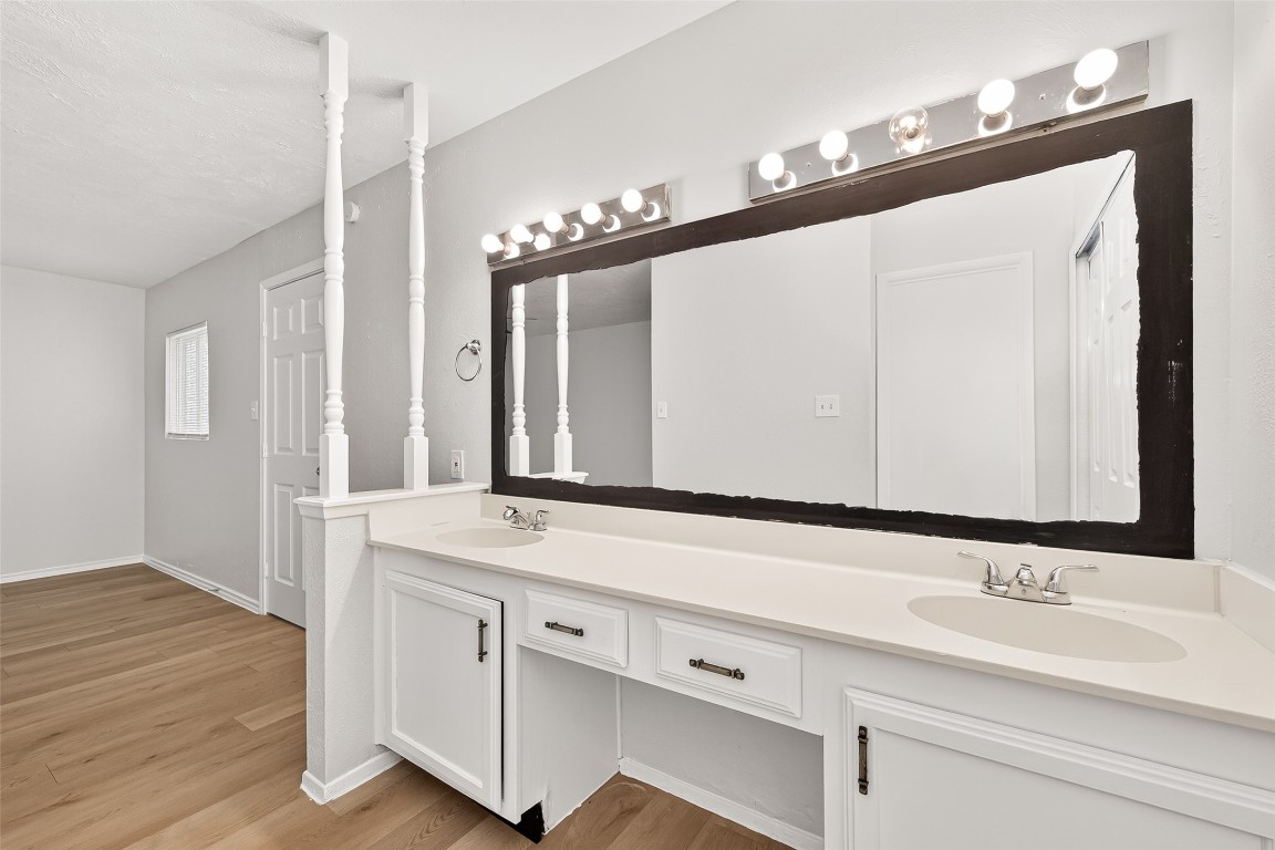 17421 Ranch Country Road Hockley, TX 77447 - Photo 18 of 28 a bathroom with a sink and a mirror