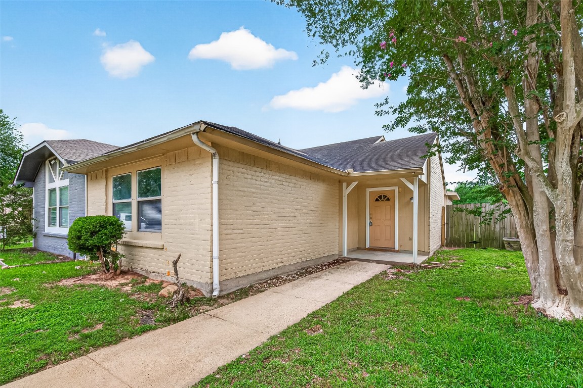 17421 Ranch Country Road Hockley, TX 77447 - Photo 2 of 28 a view of a house with a yard and large tree