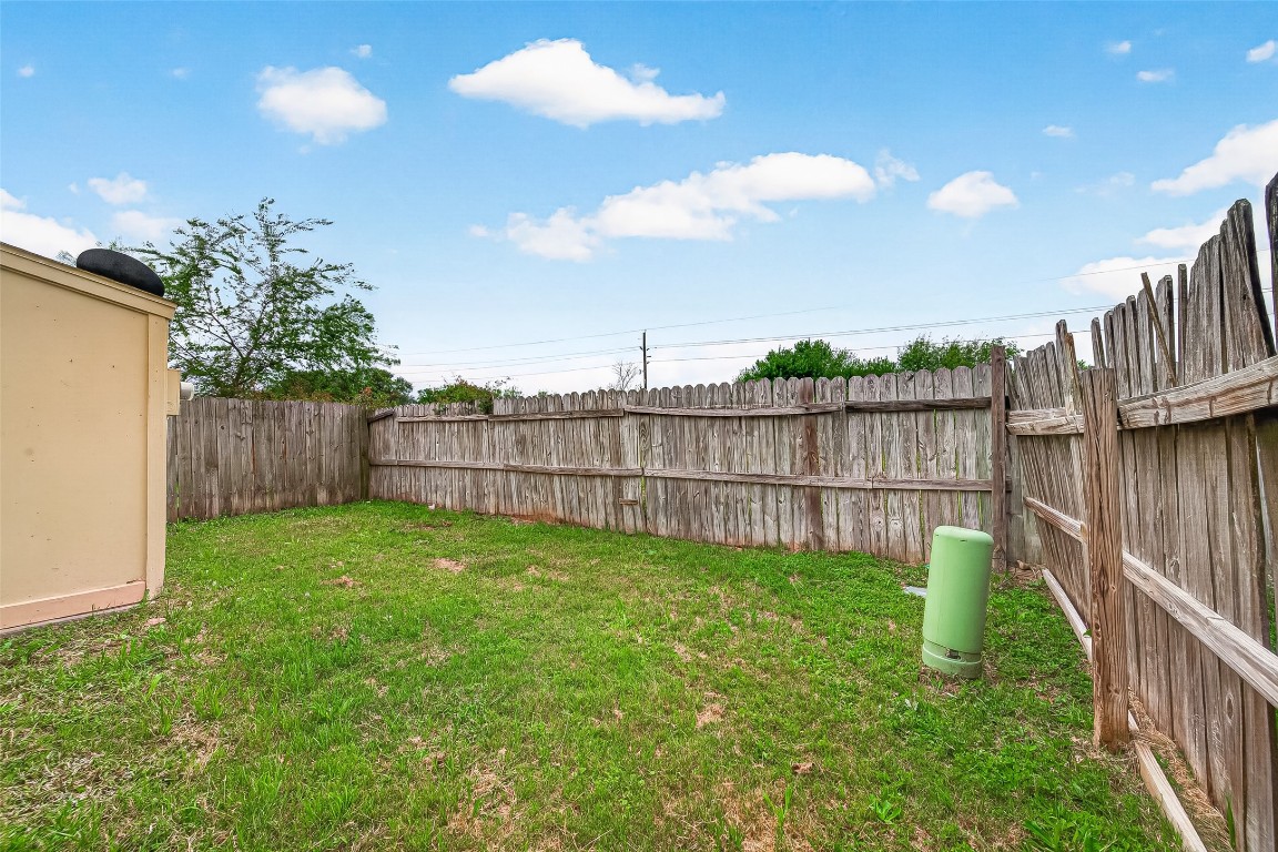 17421 Ranch Country Road Hockley, TX 77447 - Photo 27 of 28 a garden with wooden fence