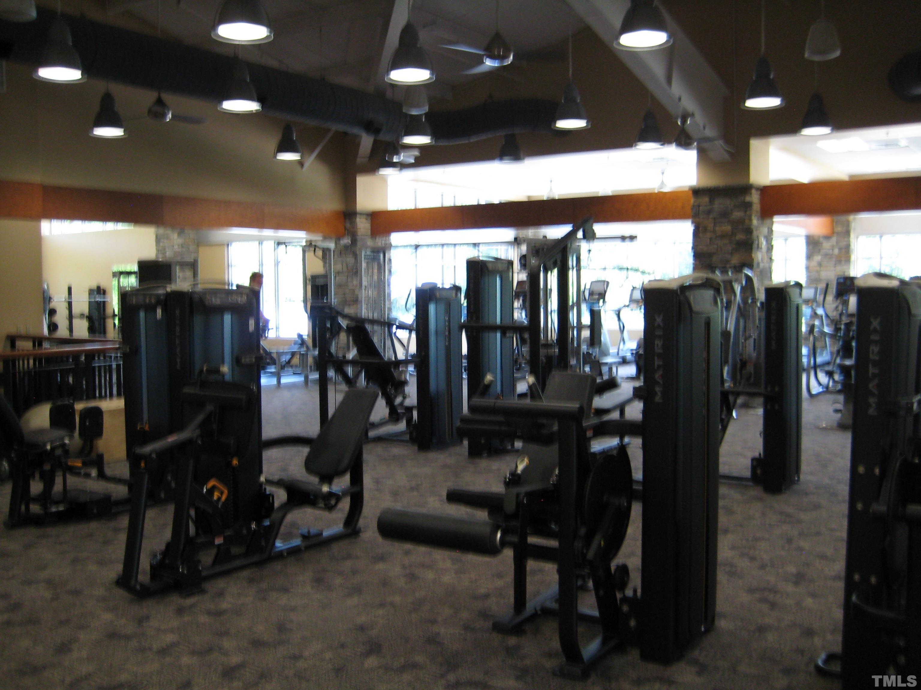 143 Rolesville Ridge Drive Rolesville, NC 27571 - Photo 7 of 9 a view of a room with gym equipment