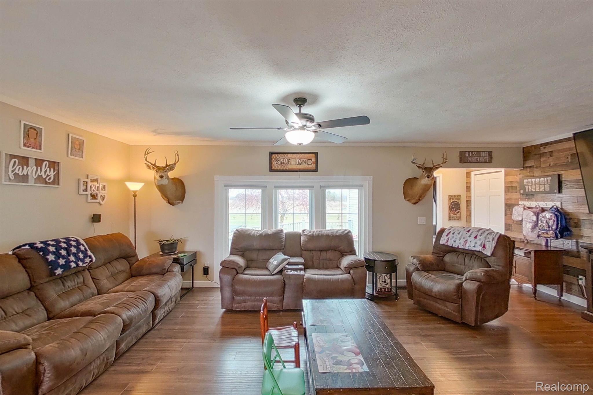 7446 North Lapeer Road Fostoria, MI 48435 - Photo 7 of 41 Living room with bay window