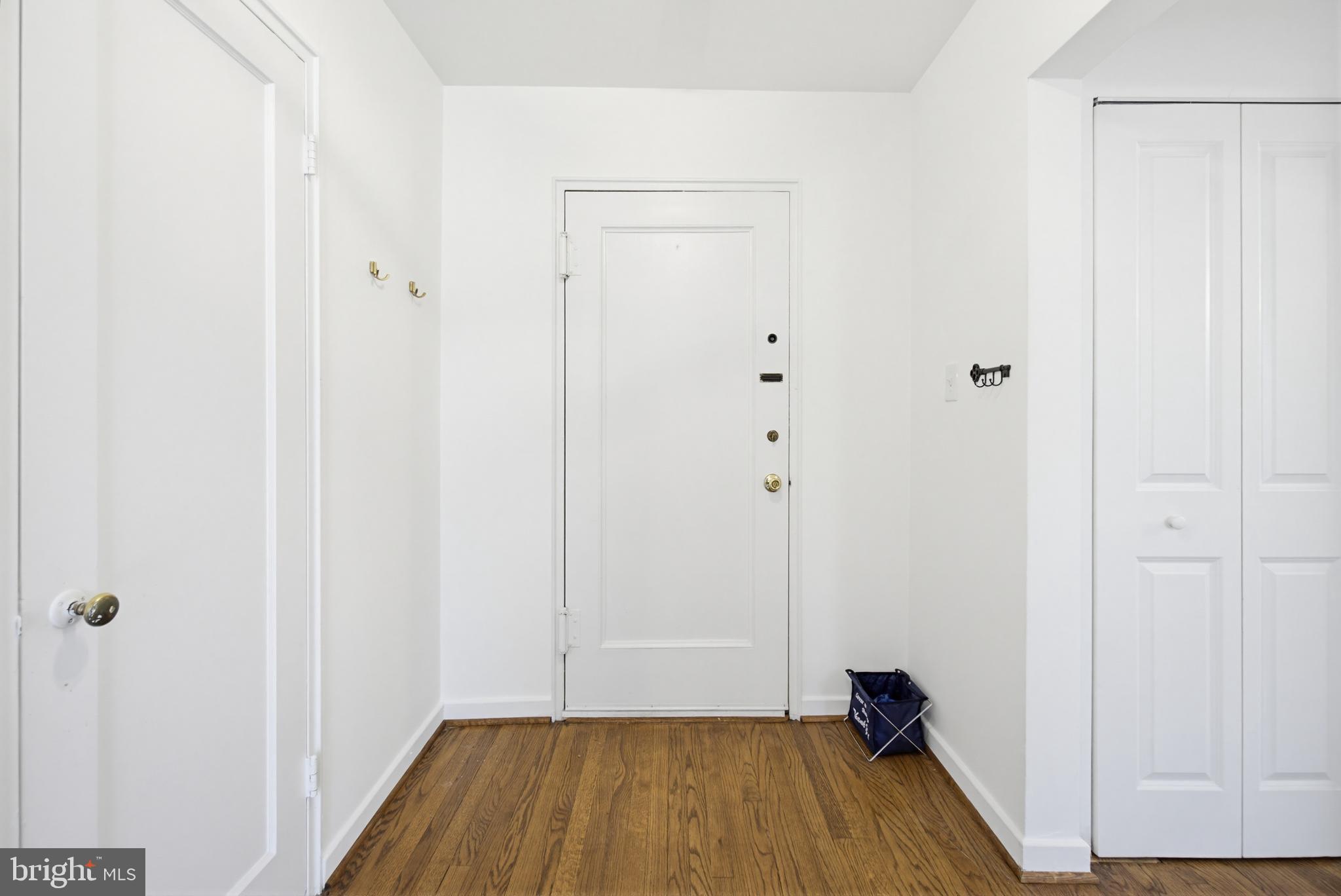 2214 Colston Drive, Unit 201 Silver Spring, MD 20910 - Photo 28 of 43 a view of a room with wooden floor and a gate