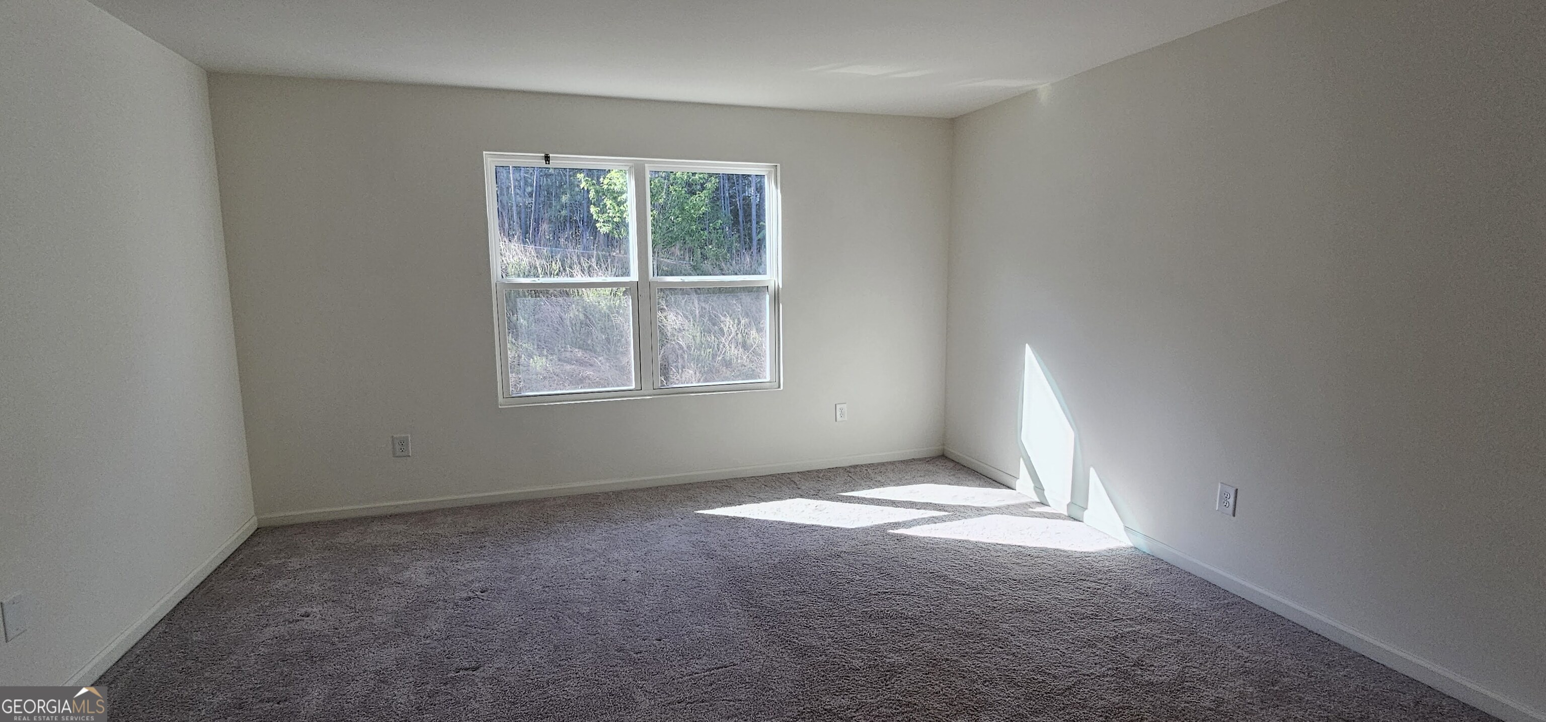 3488 Cardinal Drive Southwest Atlanta, GA 30331 - Photo 11 of 24 an empty room with windows