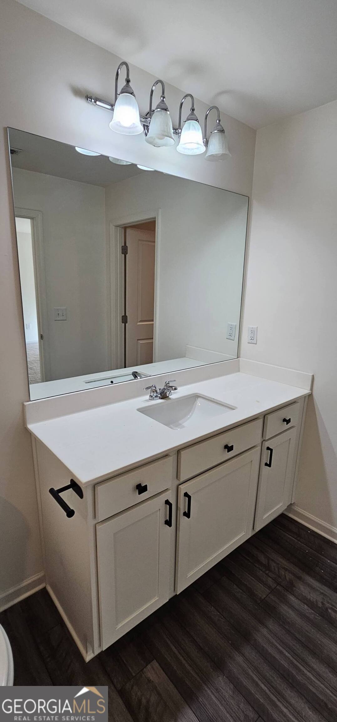 3488 Cardinal Drive Southwest Atlanta, GA 30331 - Photo 14 of 24 a bathroom with a sink and a mirror