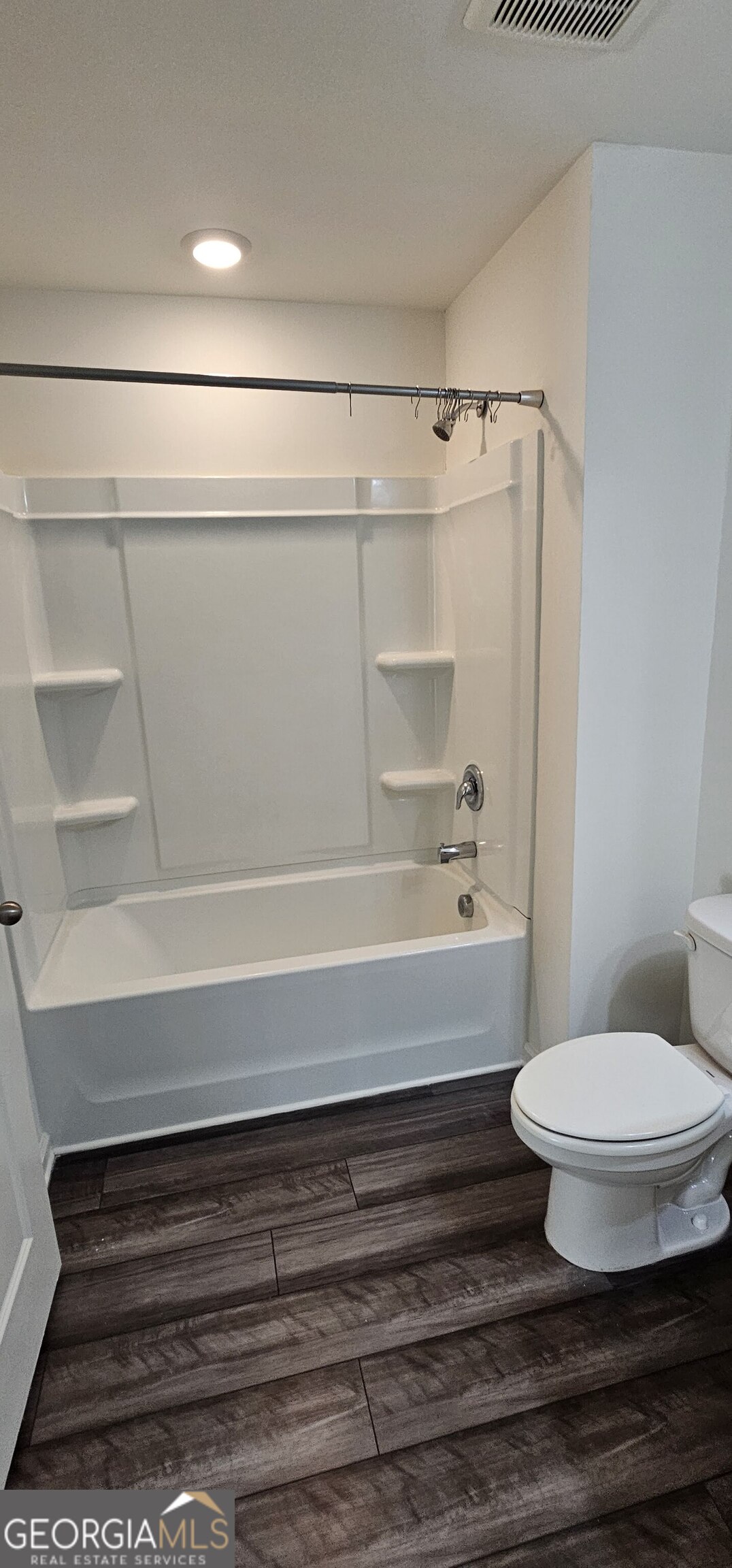 3488 Cardinal Drive Southwest Atlanta, GA 30331 - Photo 15 of 24 a bathroom with a toilet and a shower