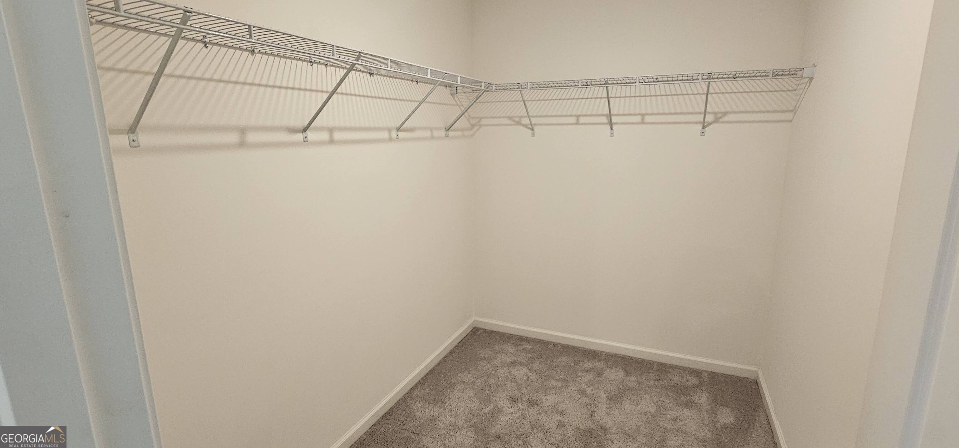 3488 Cardinal Drive Southwest Atlanta, GA 30331 - Photo 16 of 24 a view of a room with racks on the wall