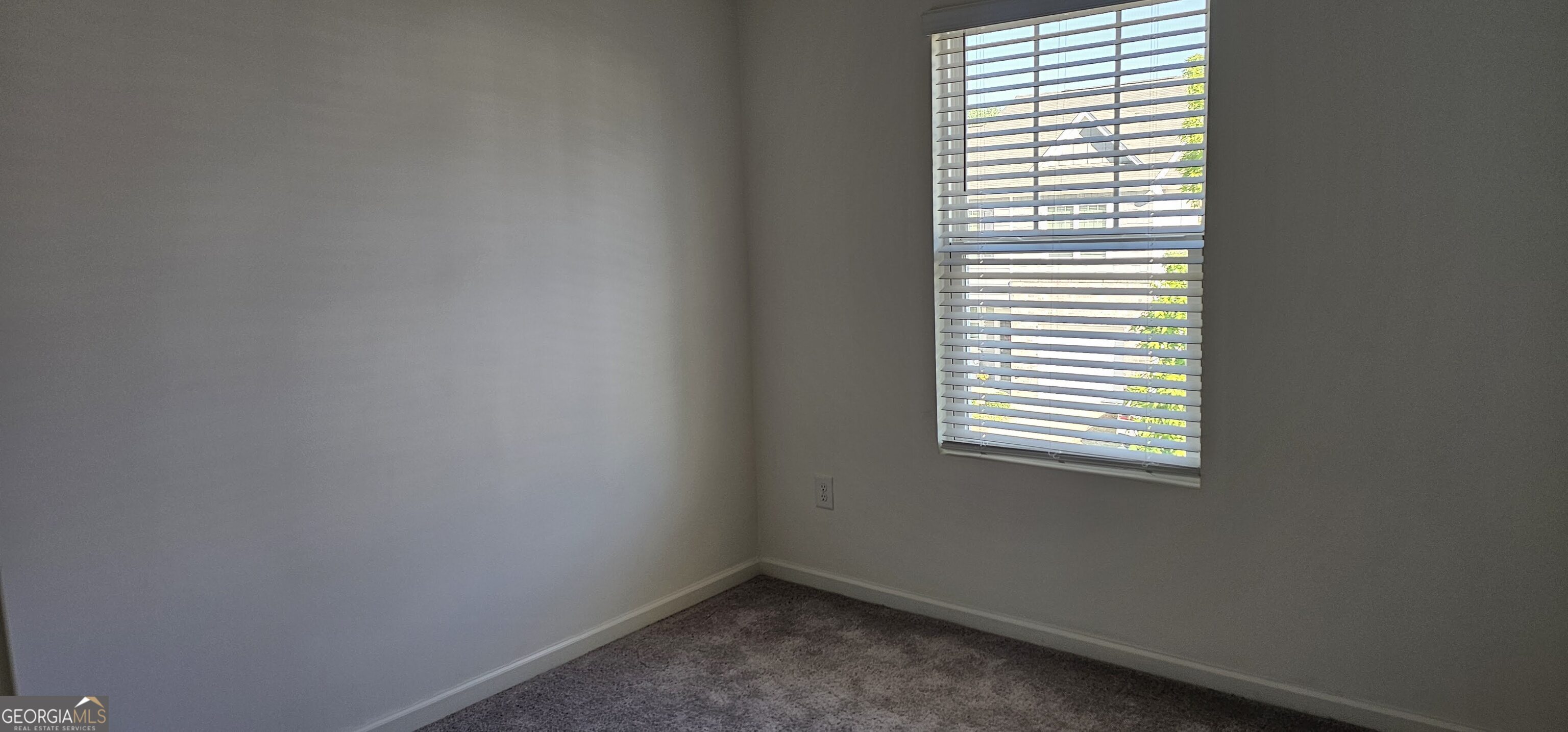 3488 Cardinal Drive Southwest Atlanta, GA 30331 - Photo 19 of 24 an empty room with a window