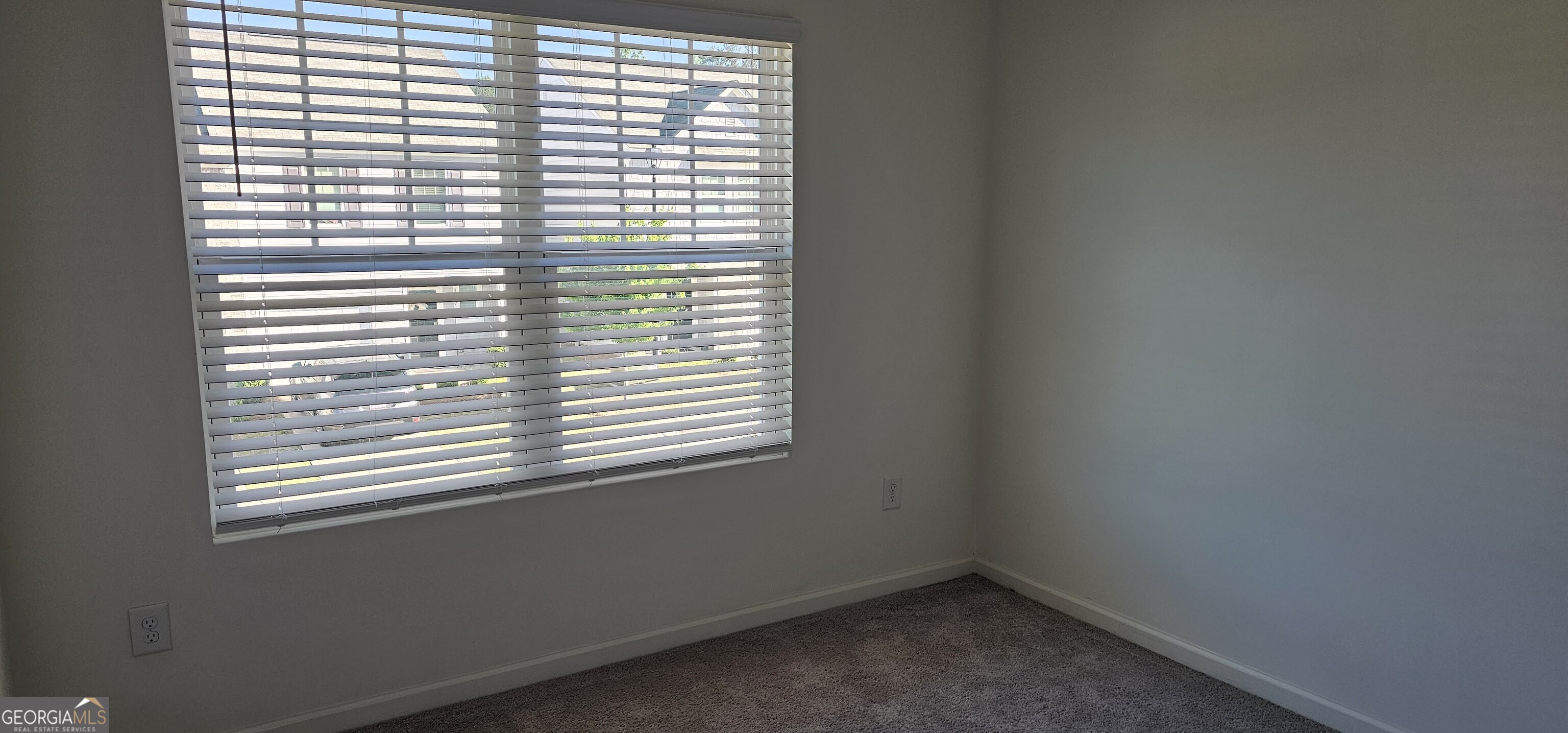 3488 Cardinal Drive Southwest Atlanta, GA 30331 - Photo 21 of 24 a view of a room that has a window in it