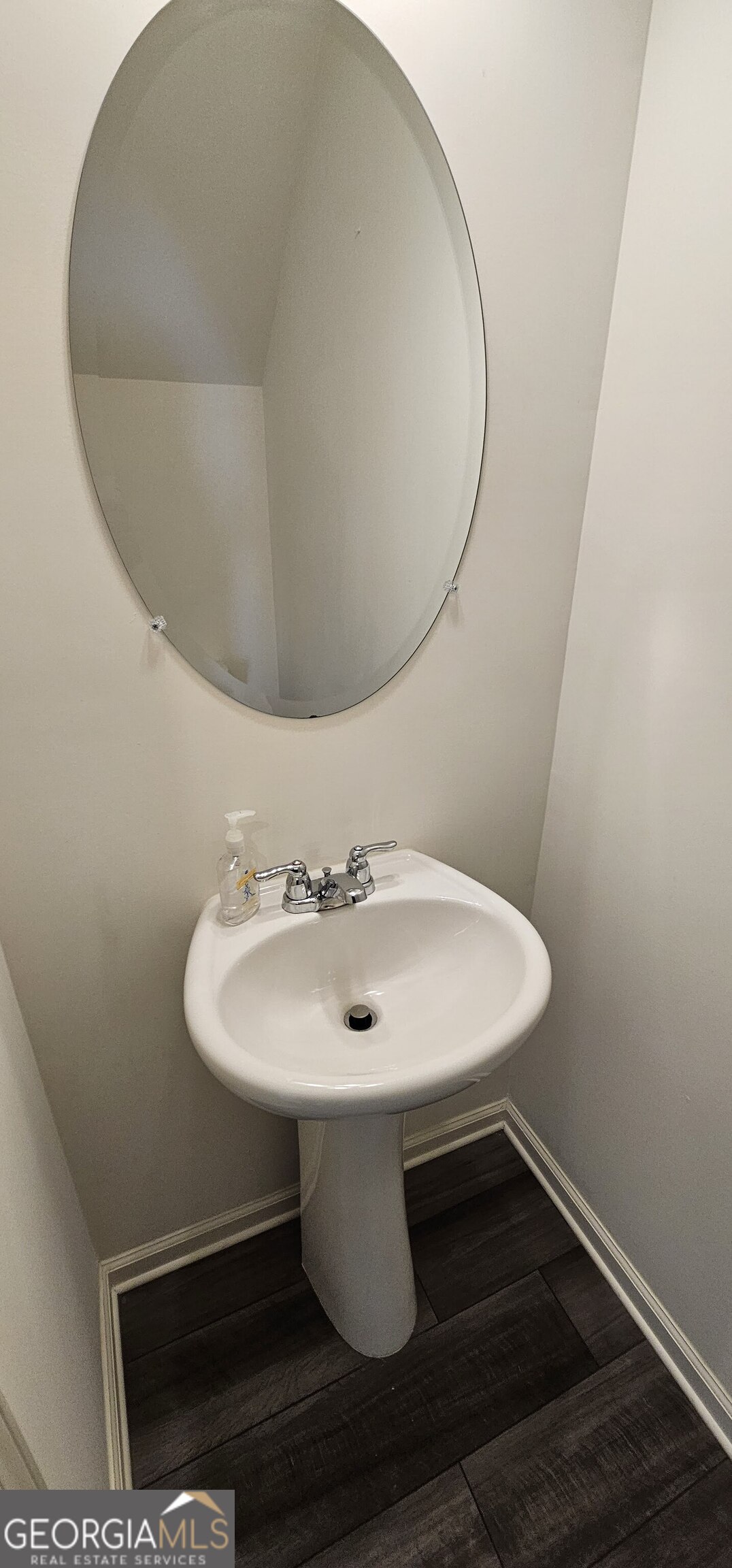 3488 Cardinal Drive Southwest Atlanta, GA 30331 - Photo 8 of 24 a bathroom with a sink toilet and mirror