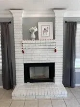 a living room with a fireplace