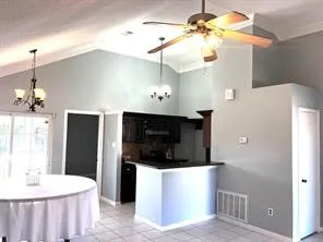 a bathroom with a sink a mirror and a shower