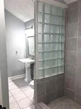 a bathroom with a sink and a toilet