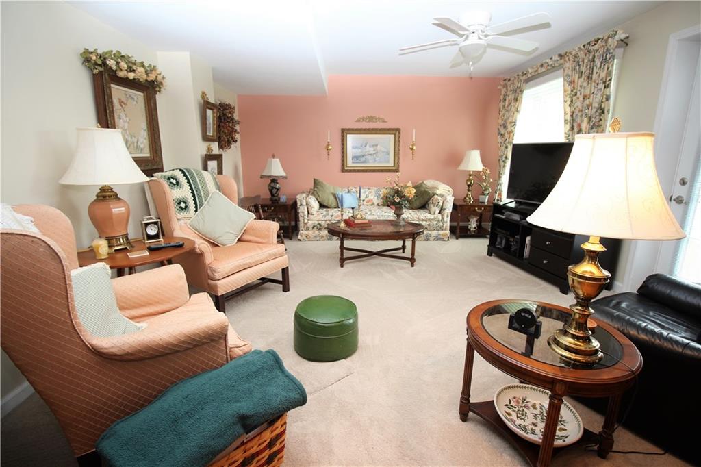 507 Saddle Ridge Court Irwin, PA 15642 - Photo 18 of 24 Spacious 35 X14 Gameroom with plenty of natural light!