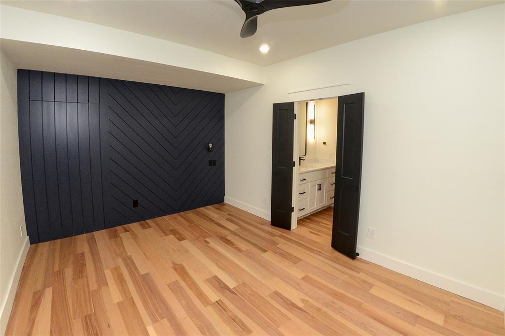 1805 Arthur Road Denison, TX 75021 - Photo 19 of 31 Unfurnished bedroom with light wood finished floors, ceiling fan, recessed lighting, and connected bathroom
