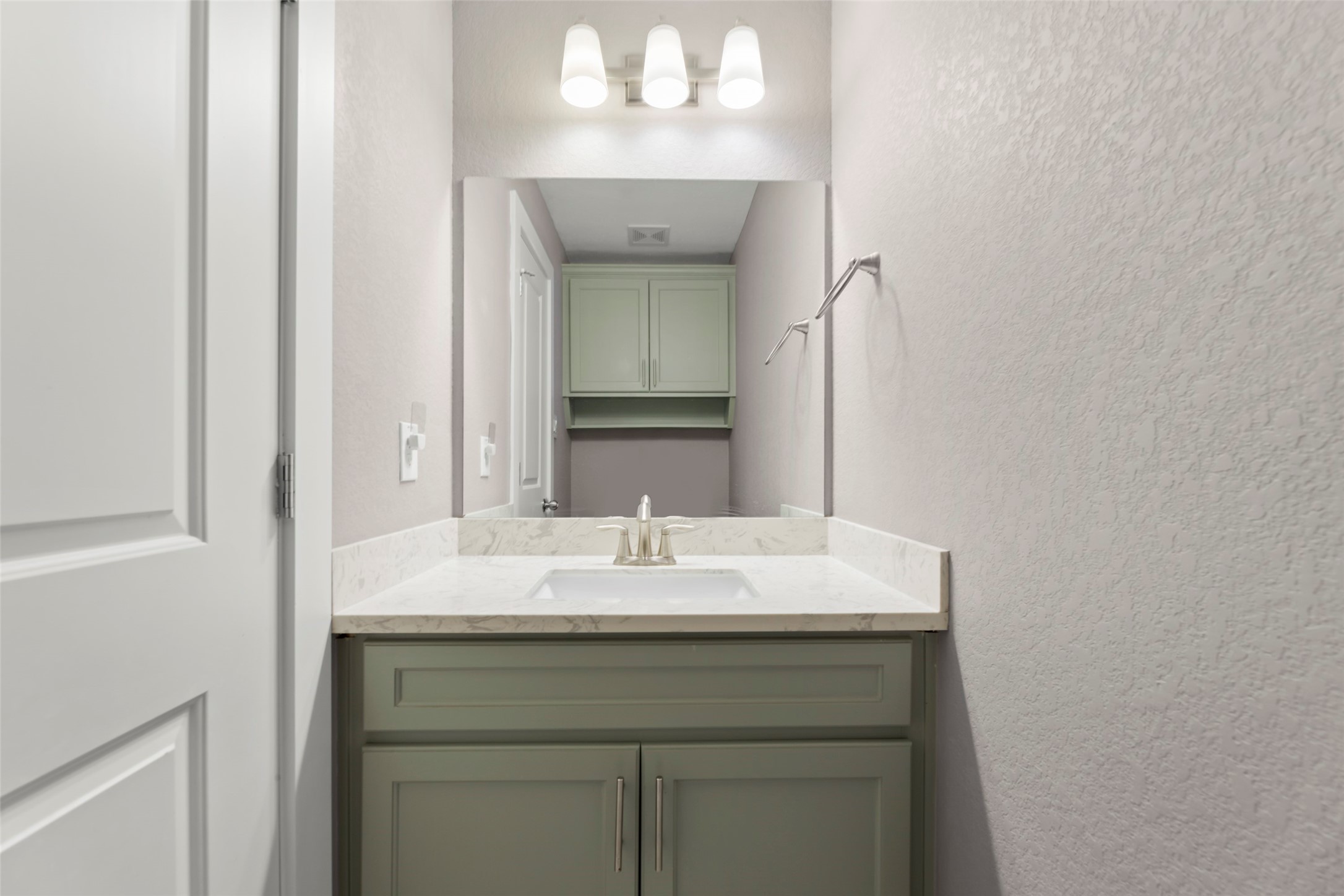 6501 Stratton Street Houston, TX 77023 - Photo 14 of 29 a sink with a mirror