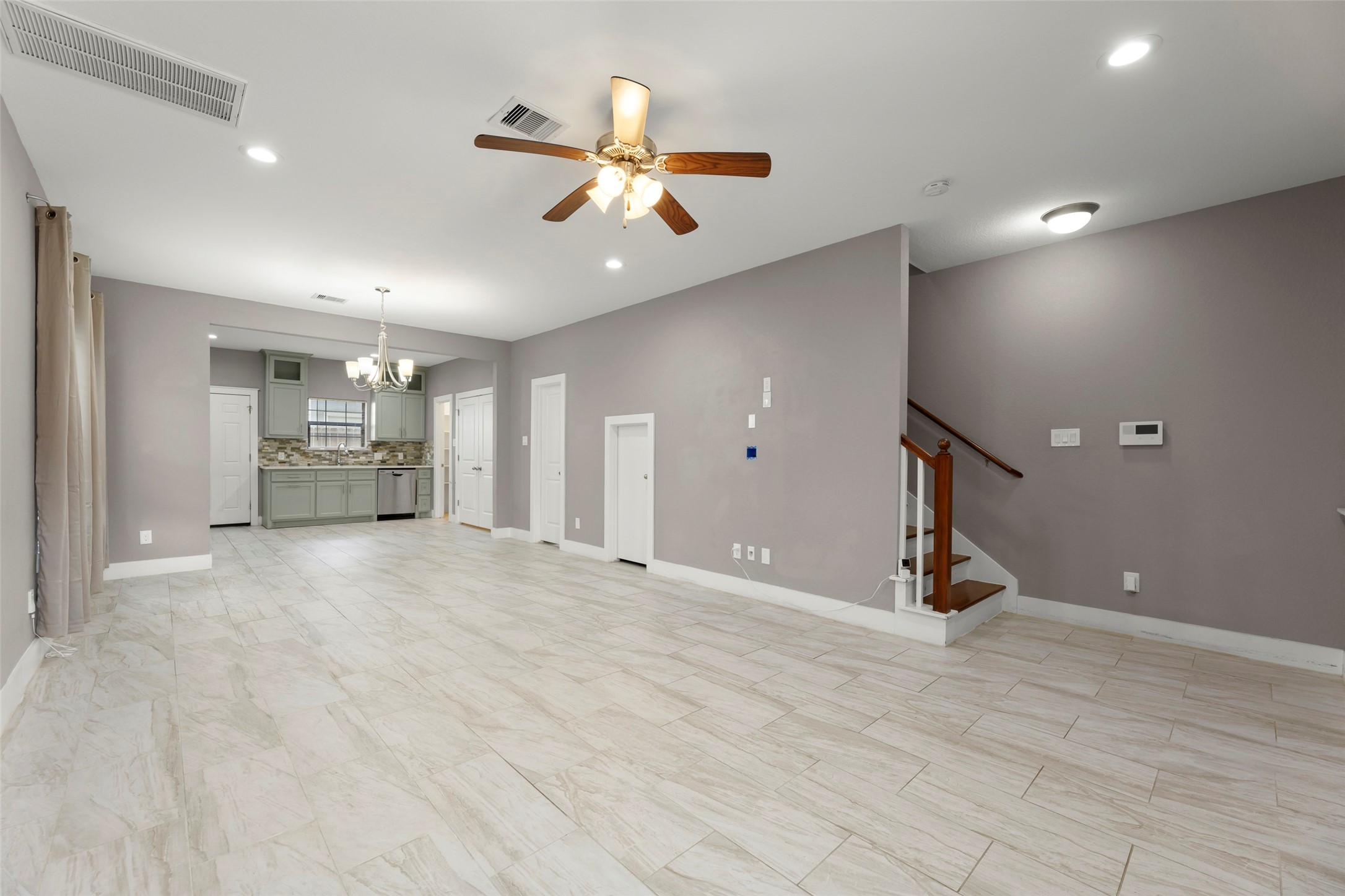 6501 Stratton Street Houston, TX 77023 - Photo 5 of 29 a view of an empty room with a window