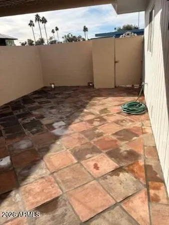 a view of a backyard of the house