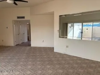 a view of an empty room with window