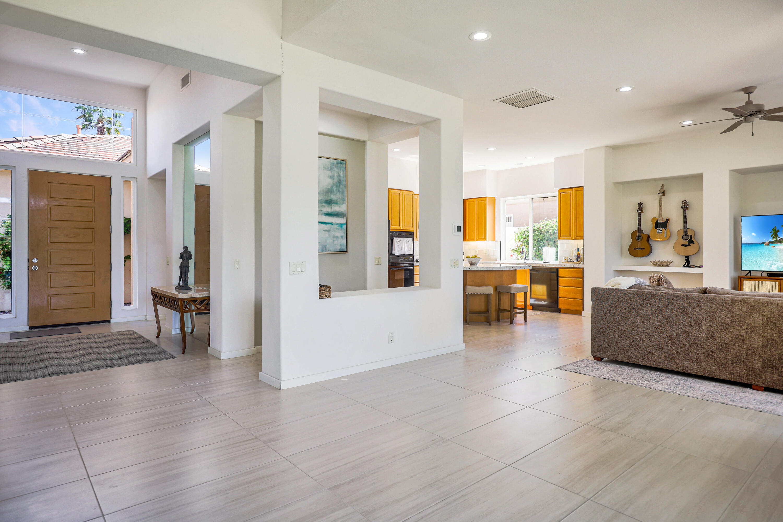 371 Tomahawk Drive Palm Desert, CA 92211 - Photo 11 of 34 a living room with furniture and a dining table