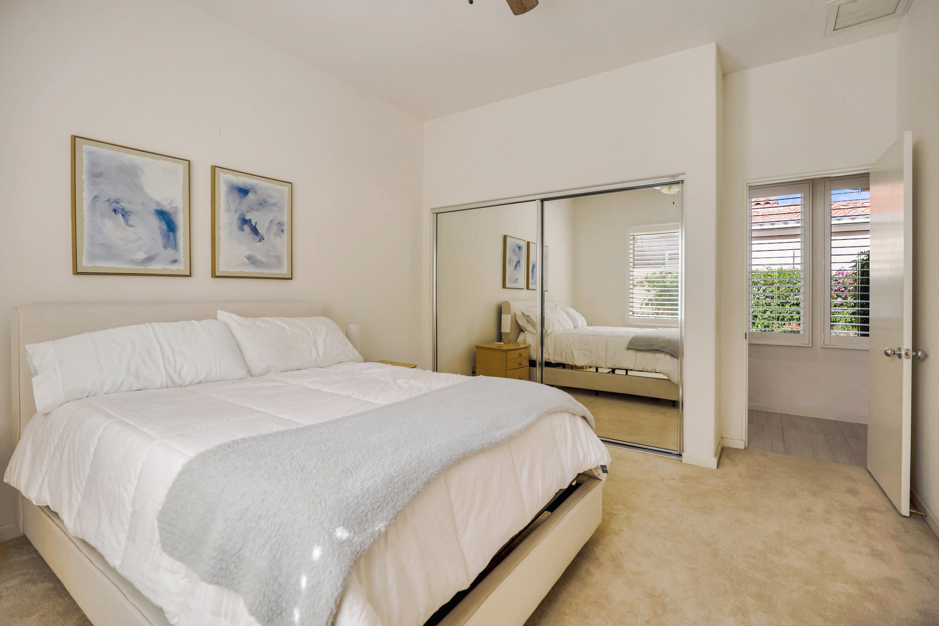 371 Tomahawk Drive Palm Desert, CA 92211 - Photo 26 of 34 a bedroom with bed and large window