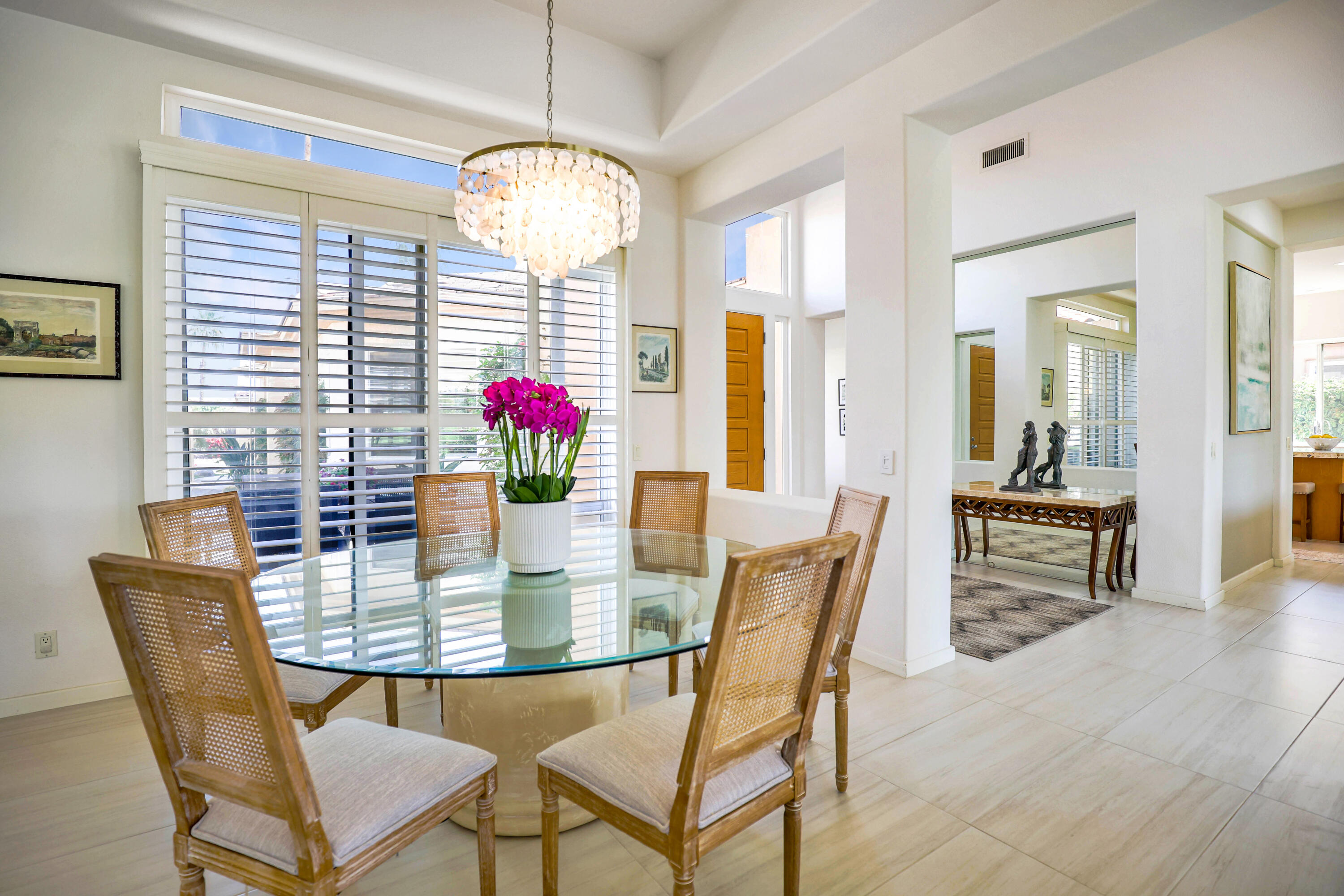 371 Tomahawk Drive Palm Desert, CA 92211 - Photo 10 of 34 a dining room with furniture and window
