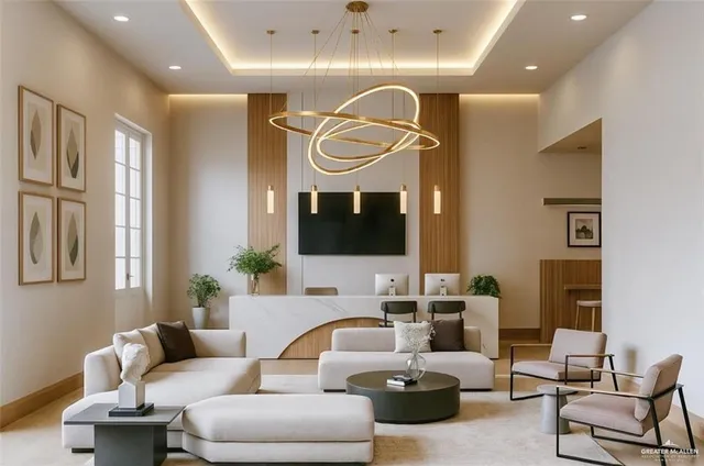 a living room with furniture a large window and a chandelier