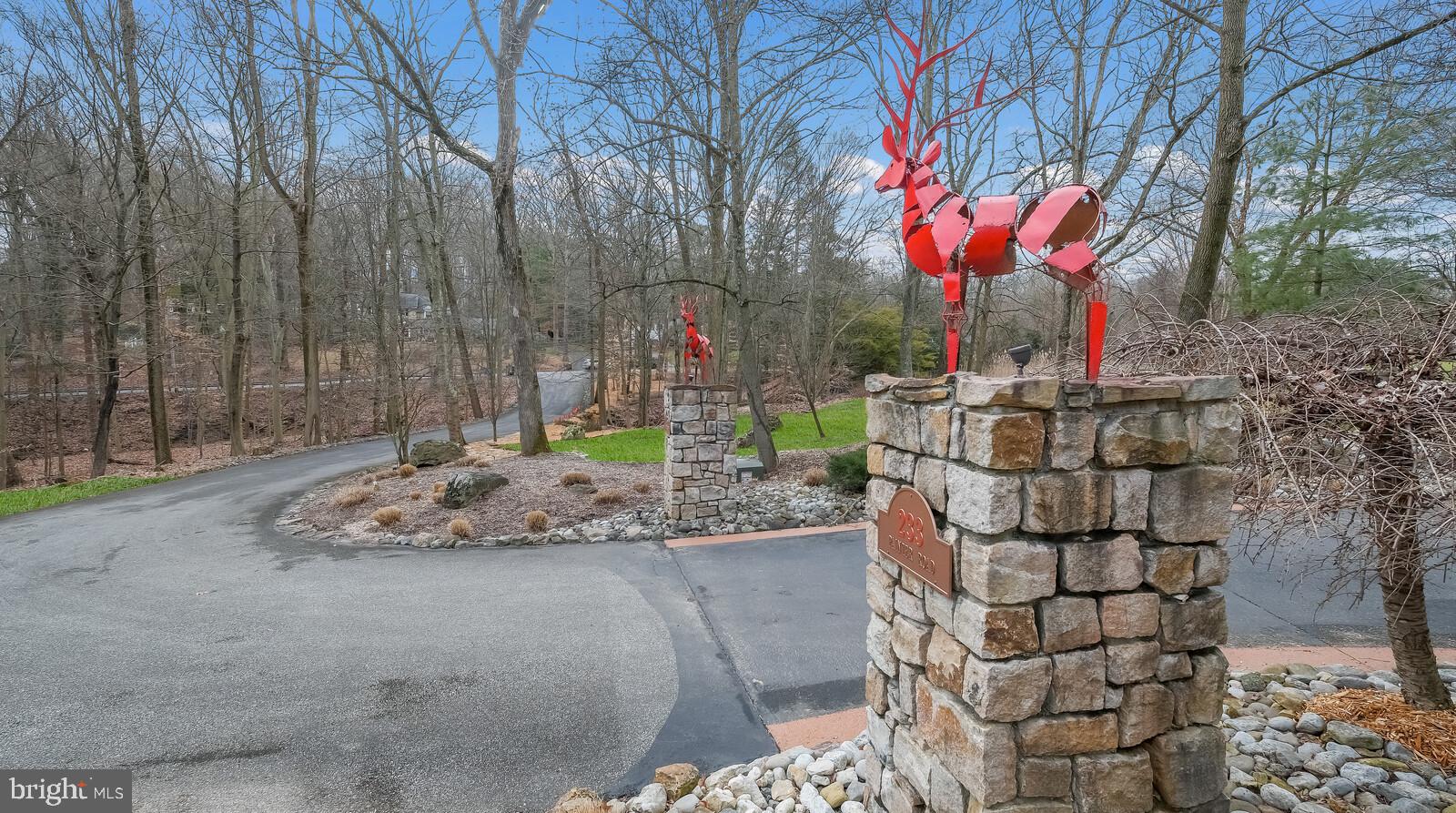 233 Painter Road Media, PA 19063 - Photo 6 of 84 dramatic stone columns with fanciful reindeer