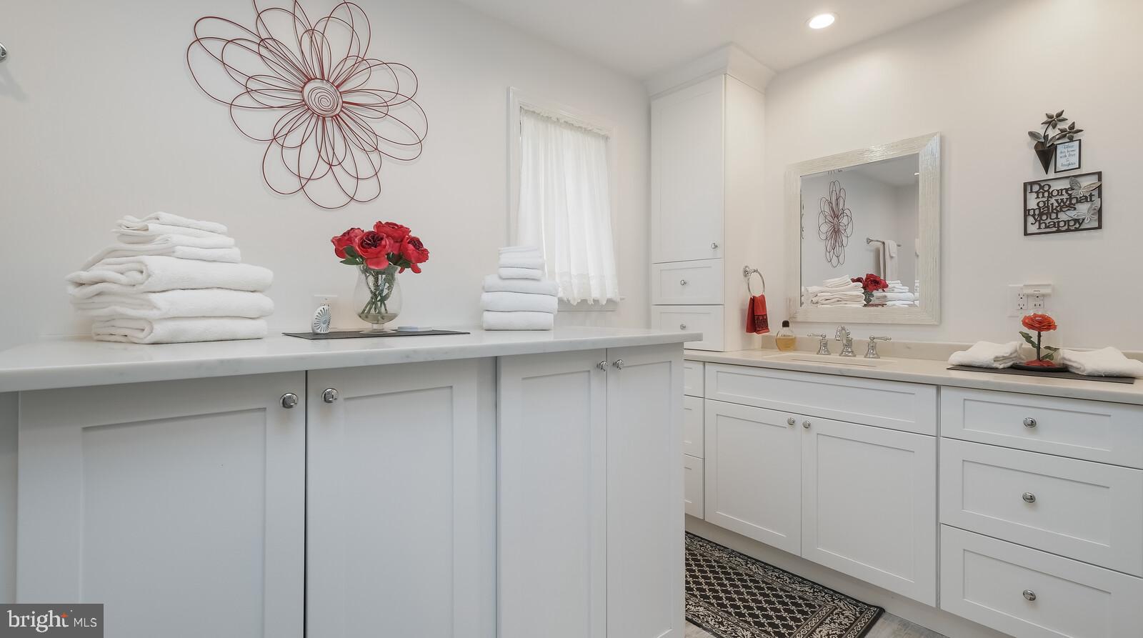 233 Painter Road Media, PA 19063 - Photo 68 of 84 Washer and dryer behind stylish cabinets