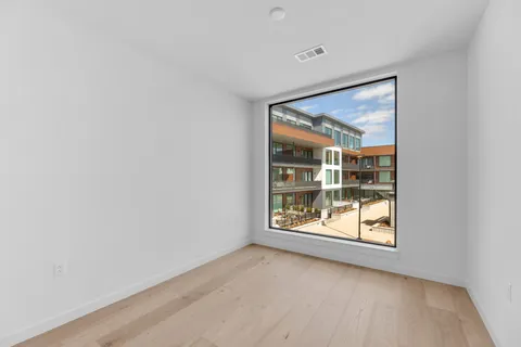 an empty room with window