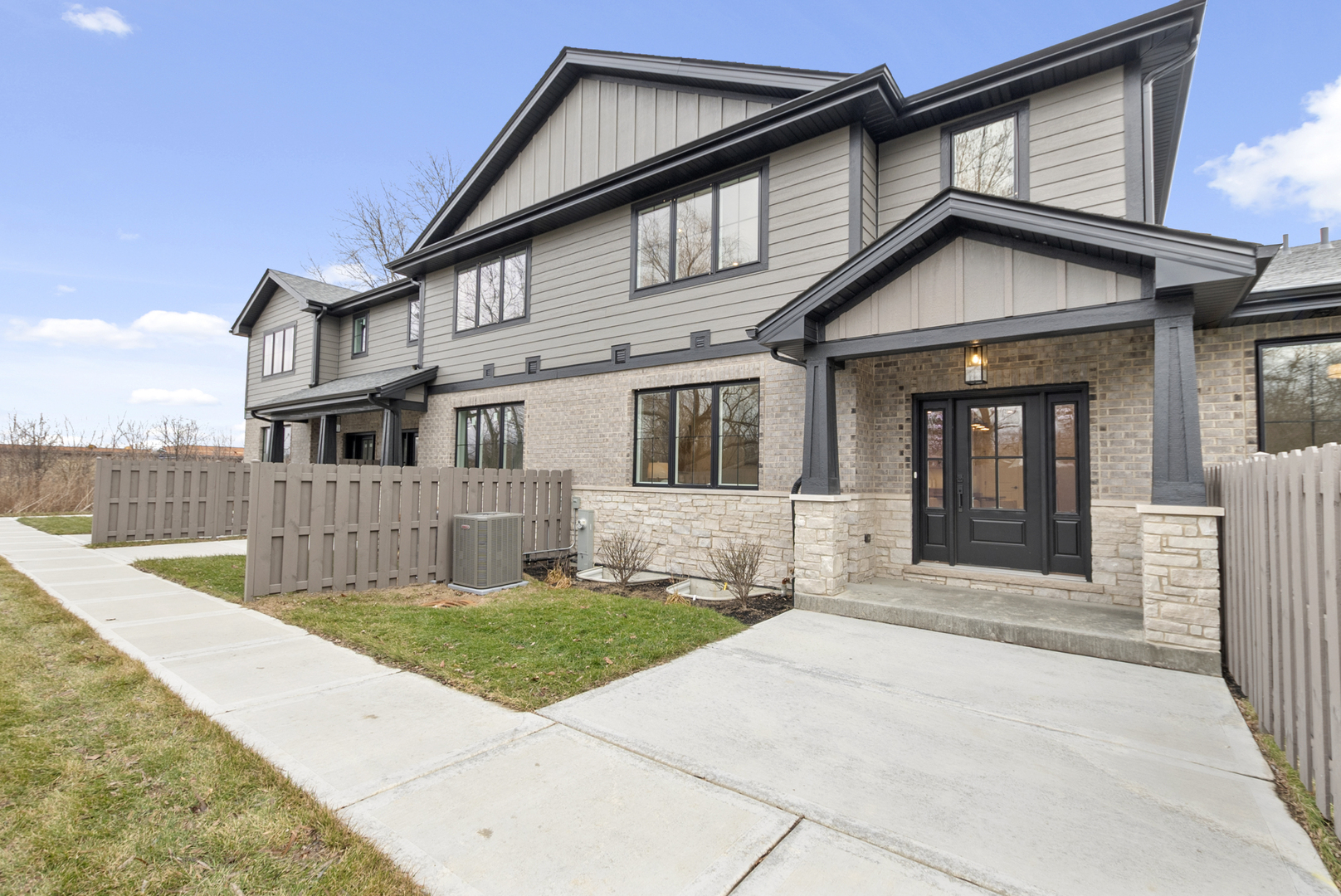 11325 1st Street Mokena, IL 60448 - Photo 34 of 34 a front view of a house with a garden and yard