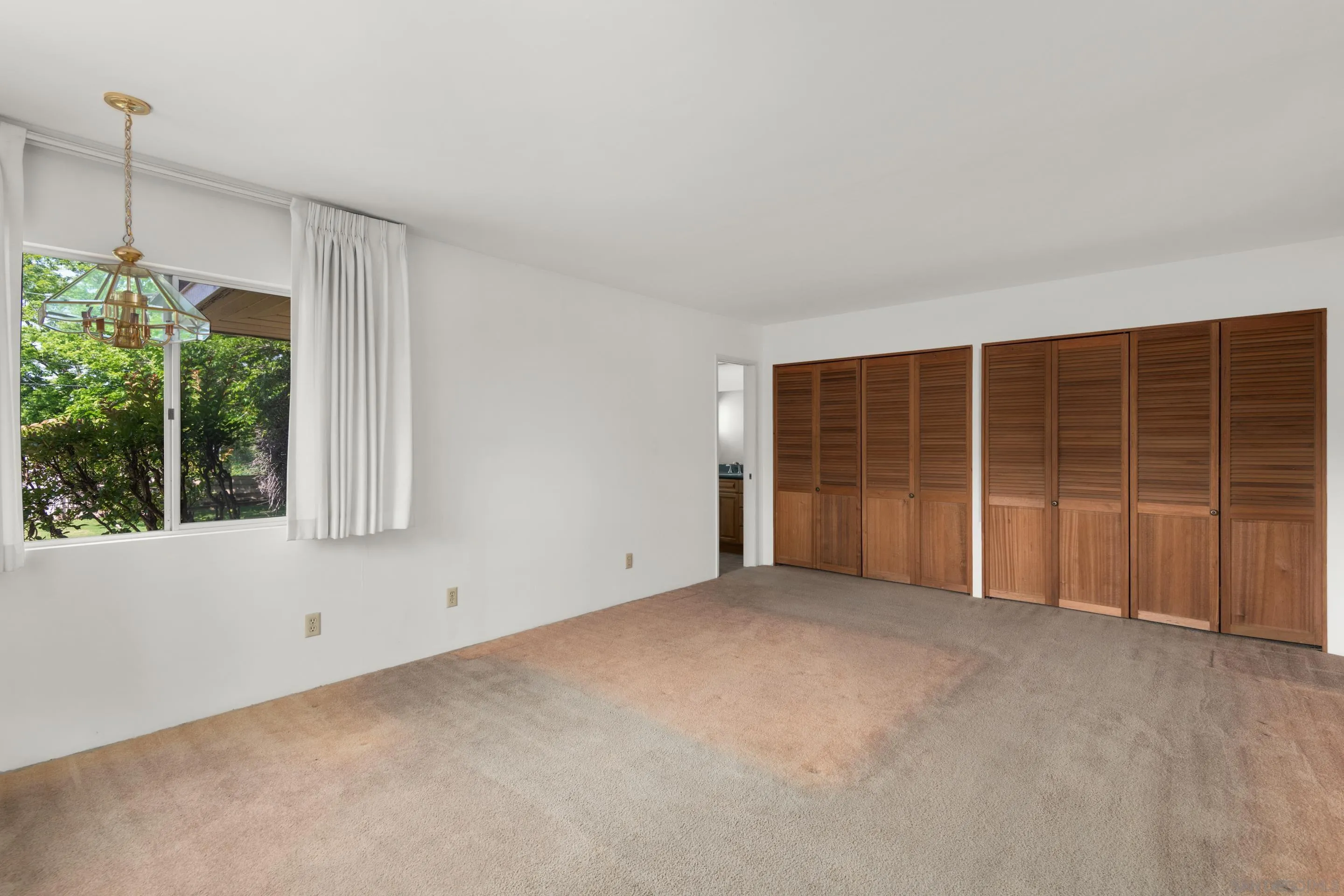 486 Murray Drive El Cajon, CA 92020 - Photo 14 of 23 a view of an empty room with a window