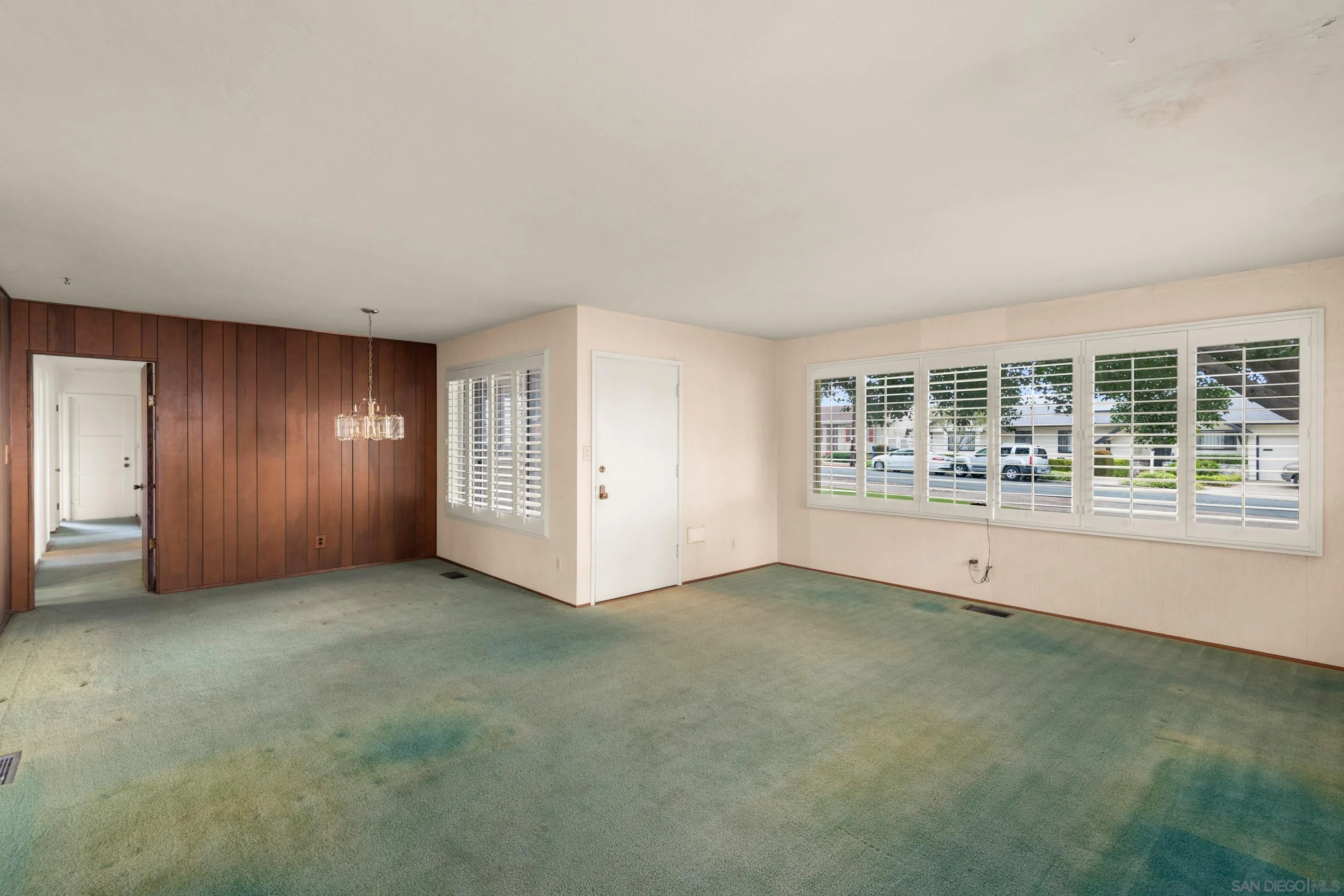 486 Murray Drive El Cajon, CA 92020 - Photo 3 of 23 an empty room with a empty space and windows