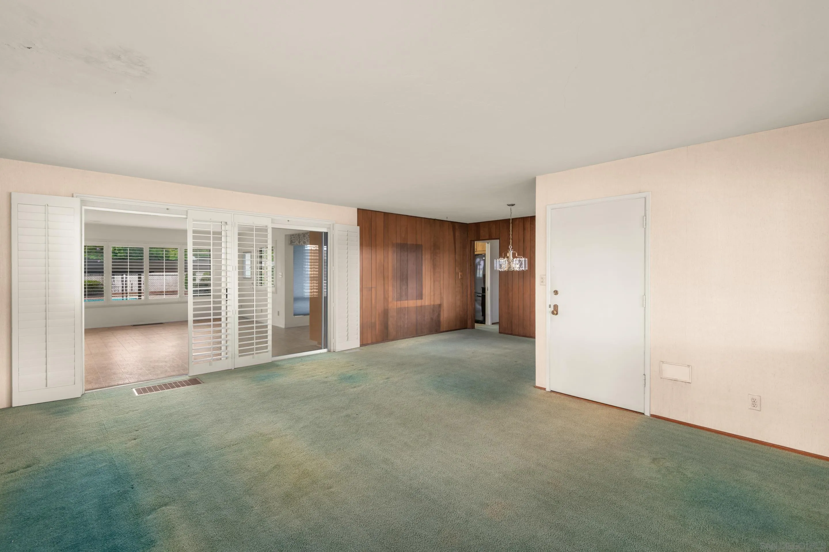 486 Murray Drive El Cajon, CA 92020 - Photo 4 of 23 a view of empty room with floor to ceiling window